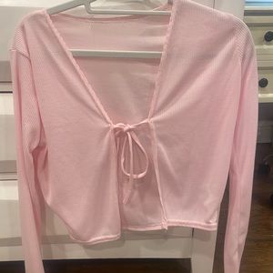 pink open tie sweater